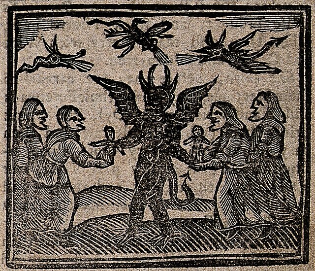 Central horned, winged devil surrounded by women offering small dolls or poppets, with birdlike familiars in the sky